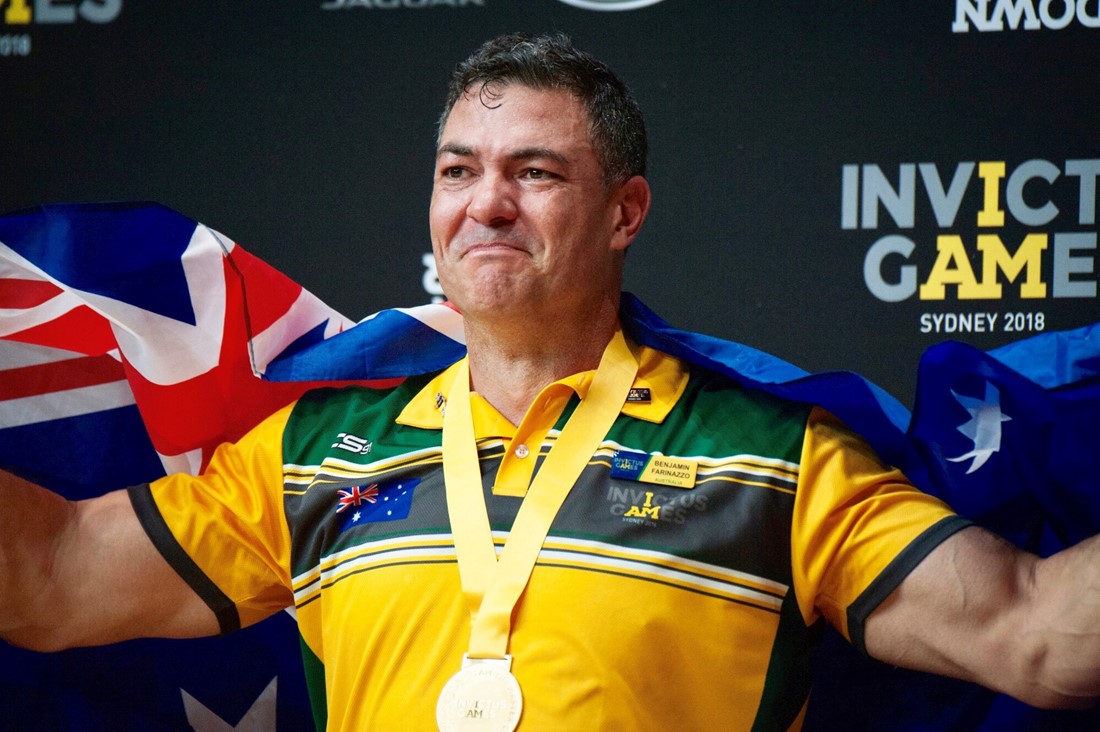 Ben with his medal